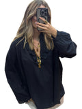 Blouse femme bleu marine à col V volanté