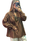 Blouse tunique femme rayée à col volanté